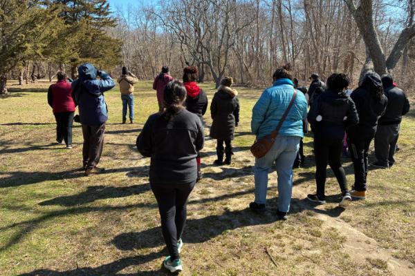 A group of people on a nature walk.
